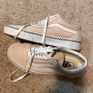 Vans- unisex.  Fits women’s size 8.5, men’s size 7.  Primary color is beige.